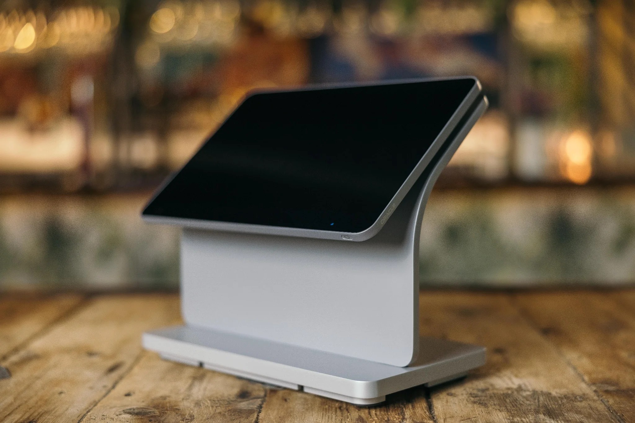 Oracle MICROS Workstation 8 with its slim screen and platinum stand